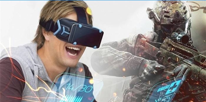 Chlap s brýlemi virtuální reality hraje počítačovou hru.
